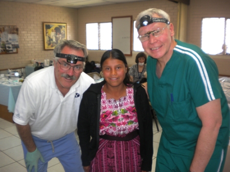 Drs. Garry Brown and Lee Olson and young Guatemalan girl